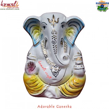 Adorn Ceramic Ganesha with a Yellow Dhoti Wedding Favors Gifts