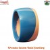 Angular design of pink and blue resin bangle bracelet